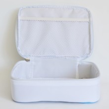 Stable storage box made of a neutral color fabric featuring a zipper.