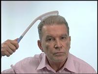 The comb allows you to reach the top or back of your head without putting undue stress on hand, arm or shoulder. 