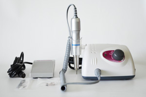Ergonomically-shaped hand unit with a professional-quality chuck and a stainless steel chassis