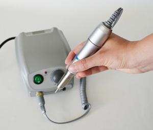 Ergonomically-shaped hand unit with a professional-quality chuck and a stainless steel chassis