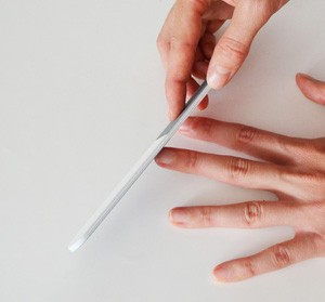 Nail file for filing and polishing the nails during manicure