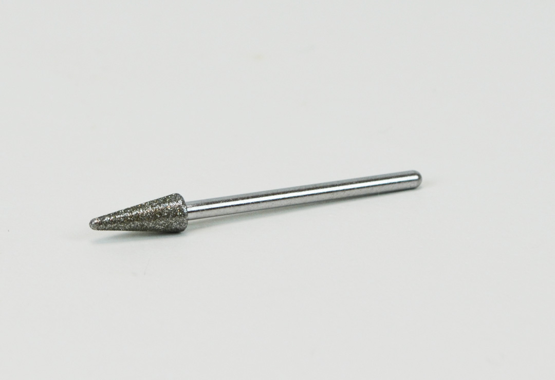 Promed diamond bit for removing the cuticle and matting the transitions and the natural nail. 
