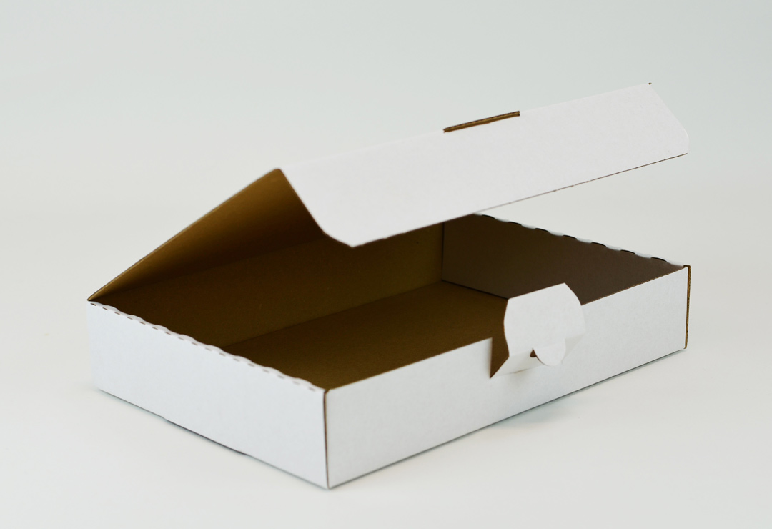 Practical cardboard box in small size for storing, transporting or shipping various objects