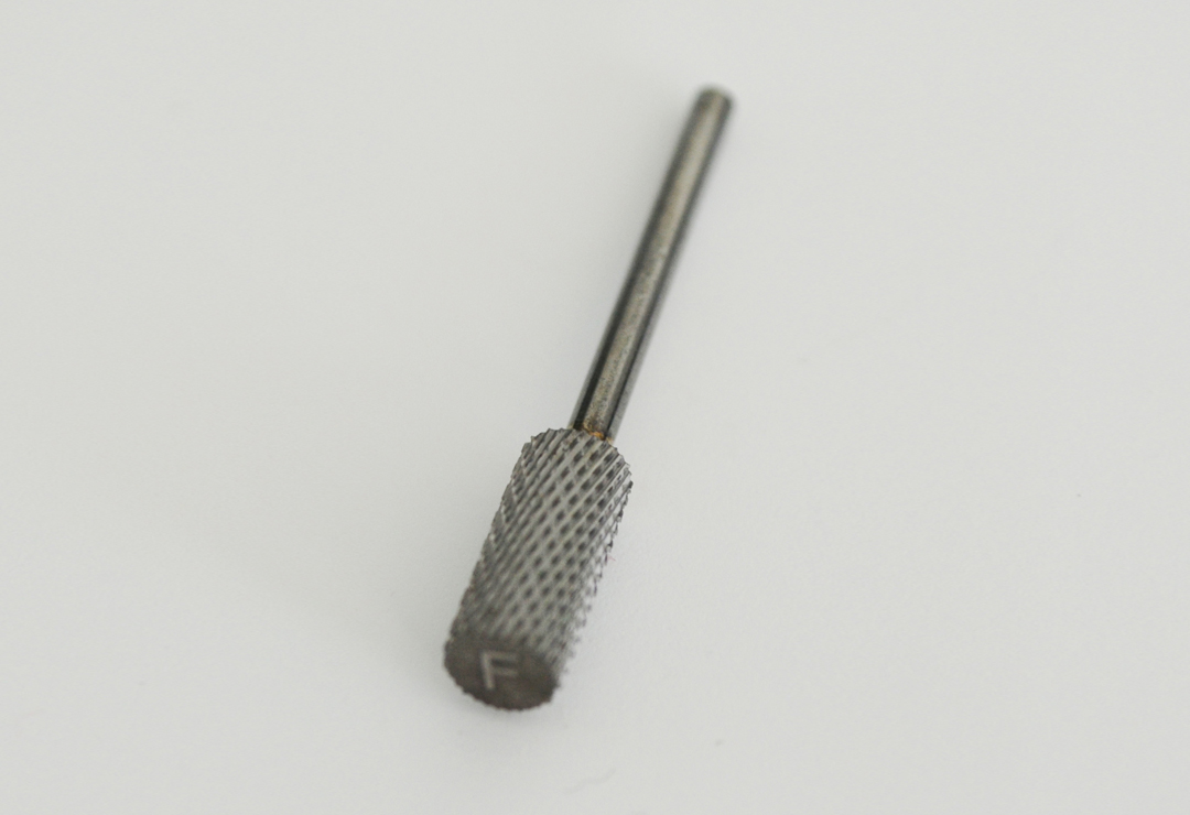 High-quality cylindrical carbide bit for various types of work on artificial nails.