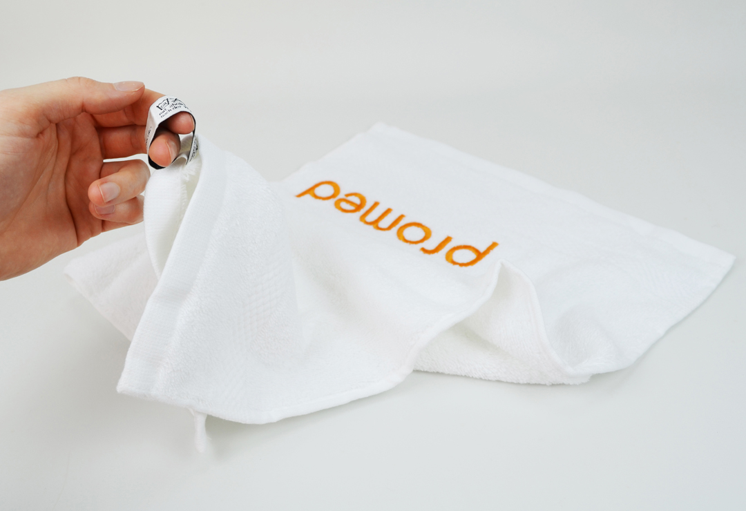 Promed towel with loop for hanging