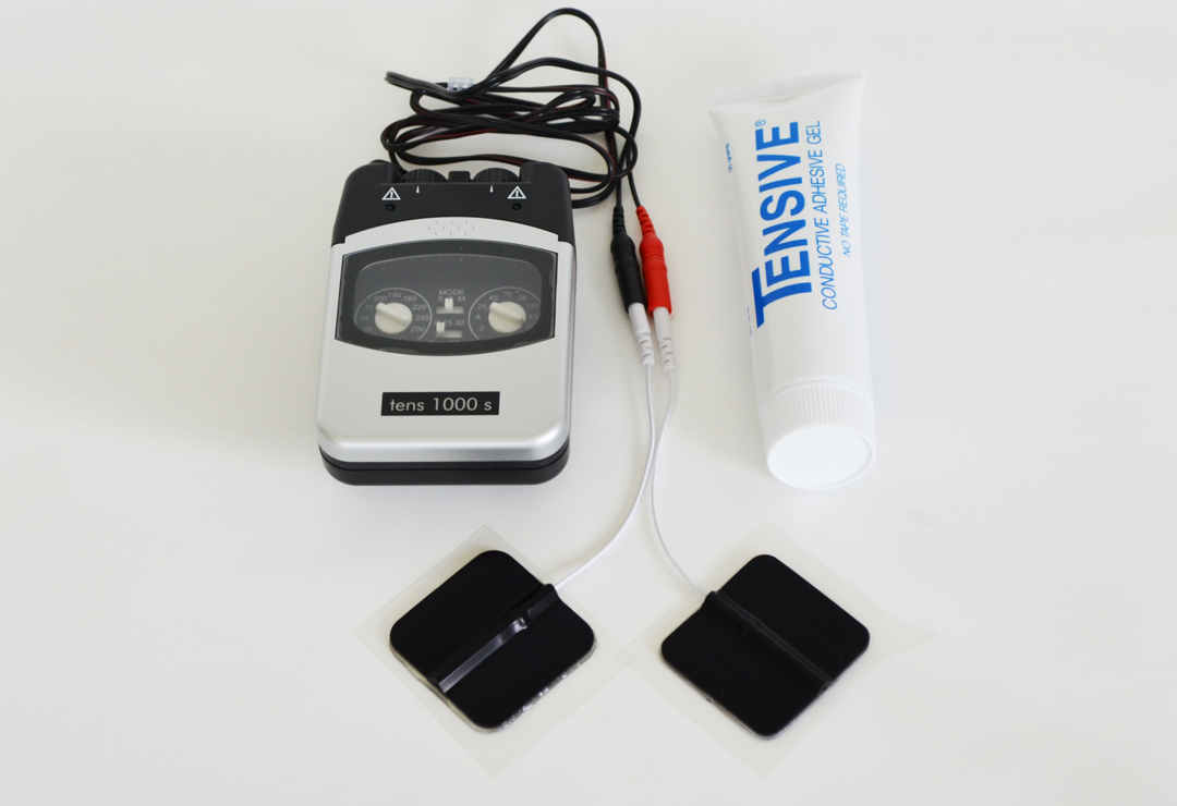 Promed TENS 1000s - here with electrodes and electrode gel