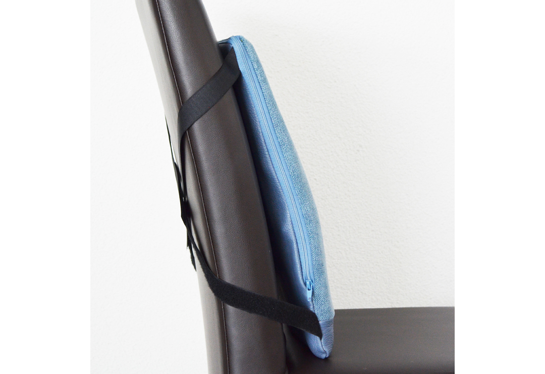 The Spina-Bac back support can easily be attached to the back of the chair