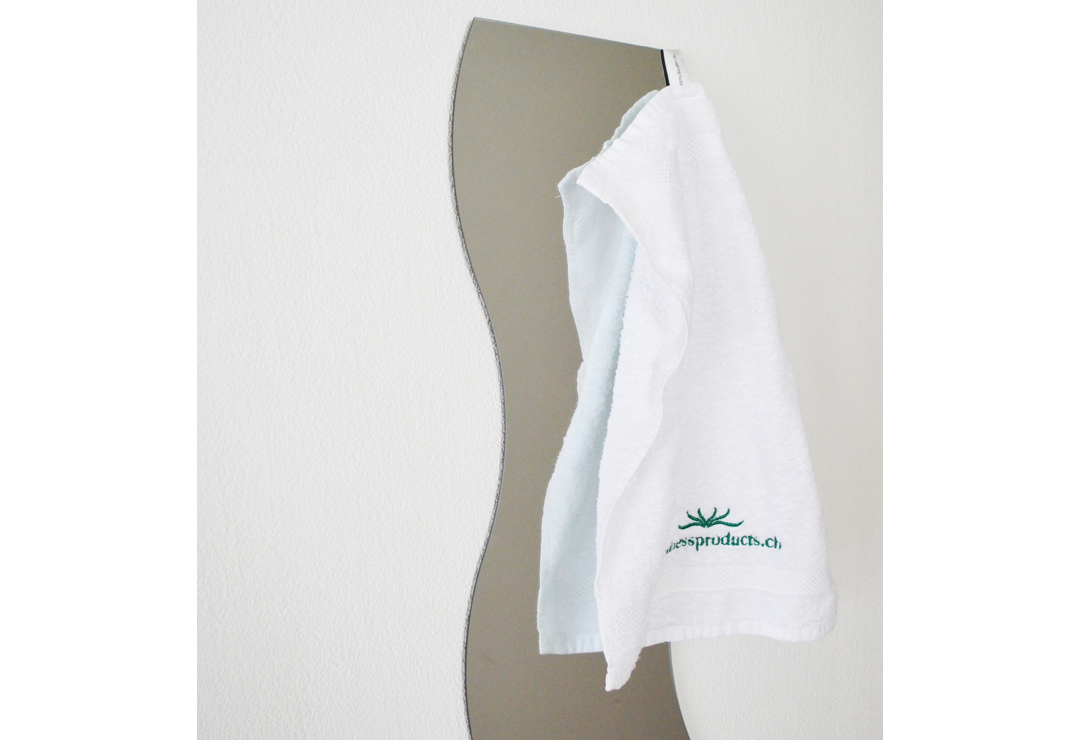 Towel with hanging loop