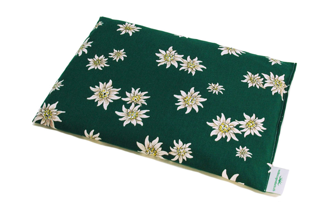 Coussin aux noyaux de cerises, vert avec motif Edelweiss