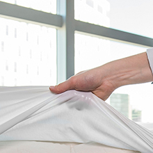 Il proteggi-materasso Pjama protegge il letto e la tua salute
